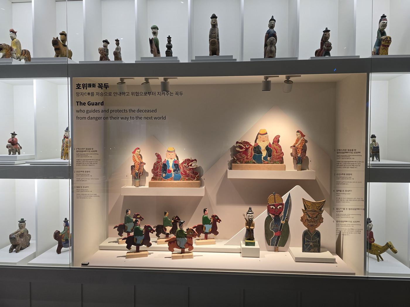 Kkokdu figures in glass display cases