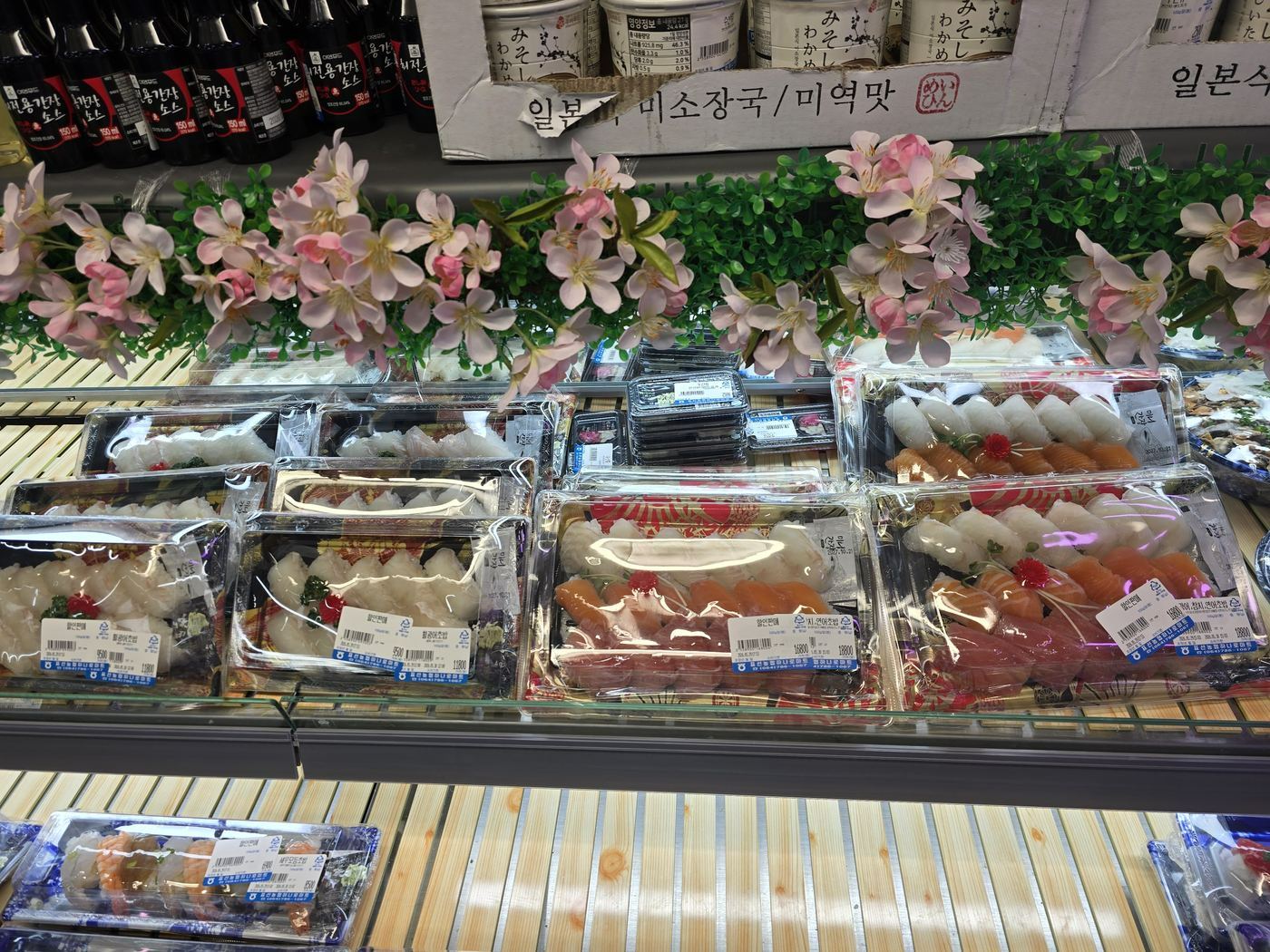 Packaged fresh seafood and sushi at Nonghyup