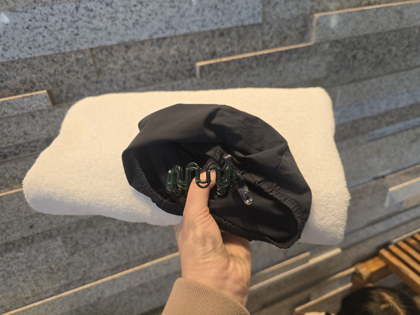 Swim caps & towels — free at the poolside