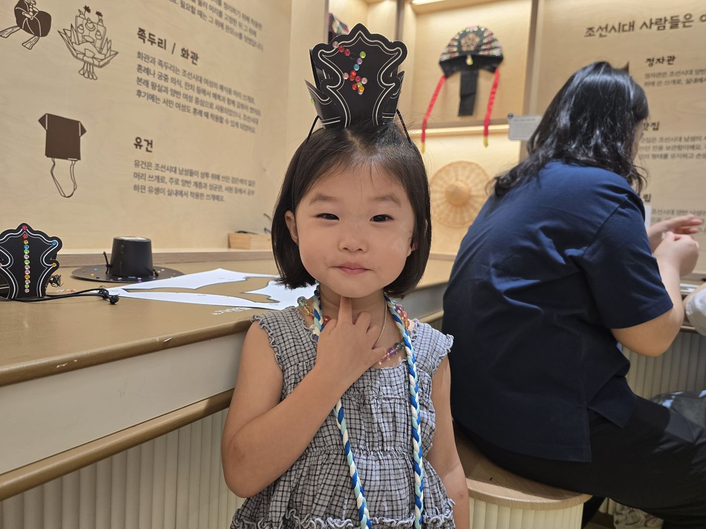 Girl proudly wearing her handmade jokduri