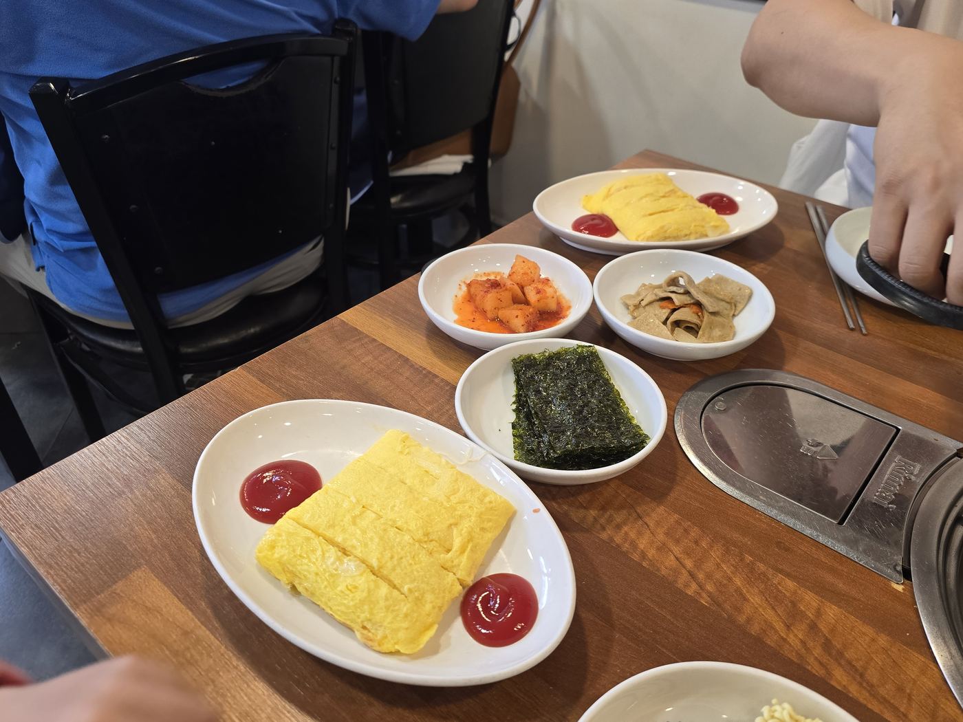 kimchi jjigae and Korean side dishes