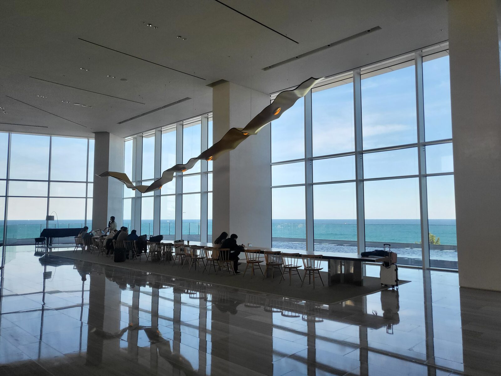 SEAMARQ Hotel Gangneung grand lobby with floor-to-ceiling ocean view and infinity pool