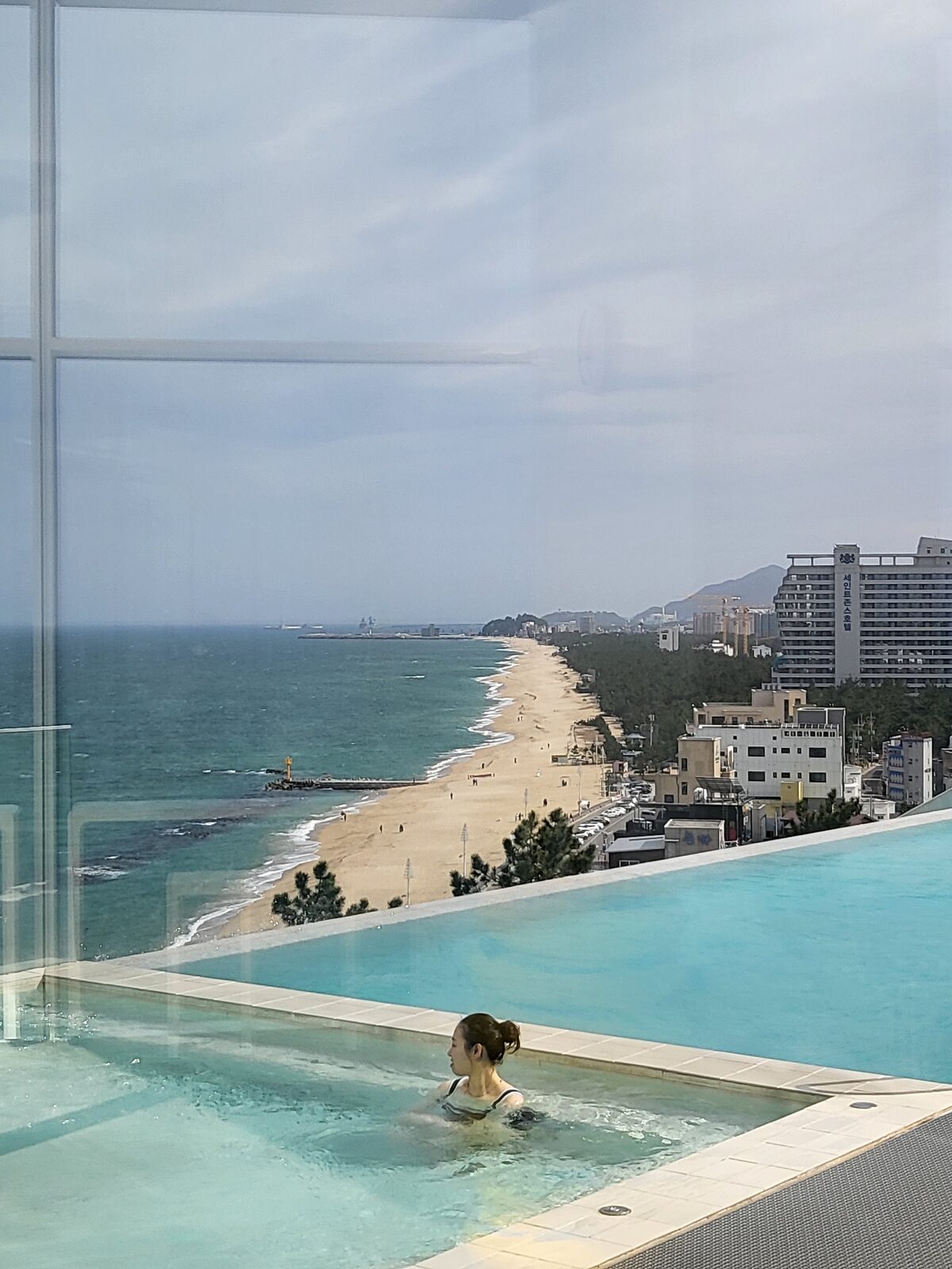 Outdoor rooftop pool overlooking Anmok Beach at SEAMARQ Hotel Gangneung