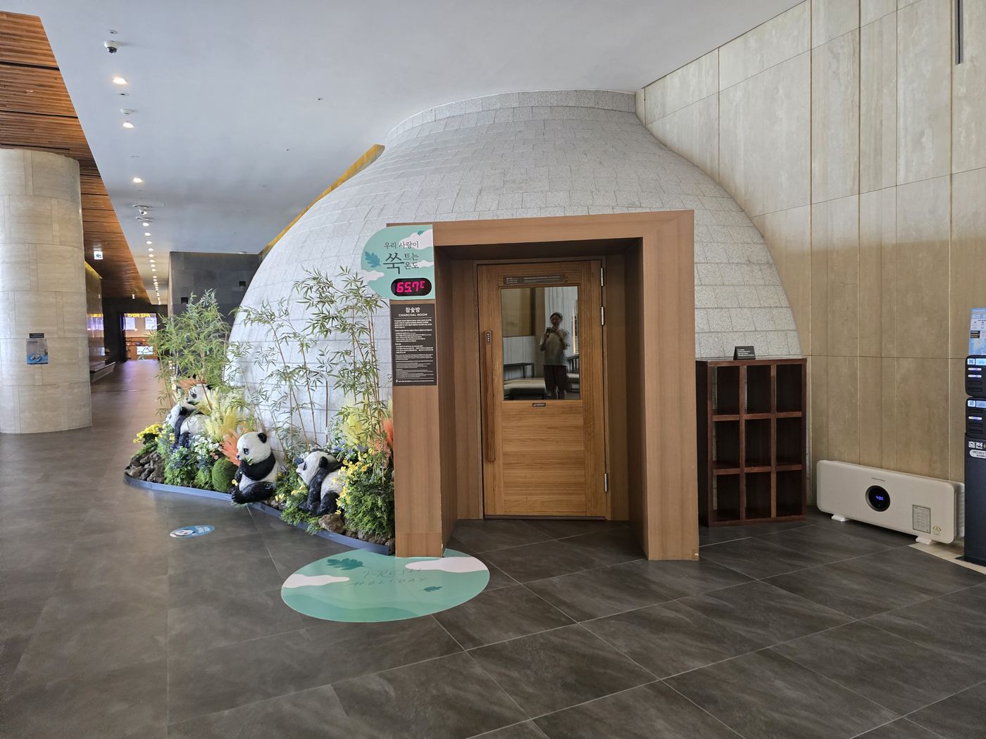 Charcoal Room dome-shaped exterior decorated with panda figures