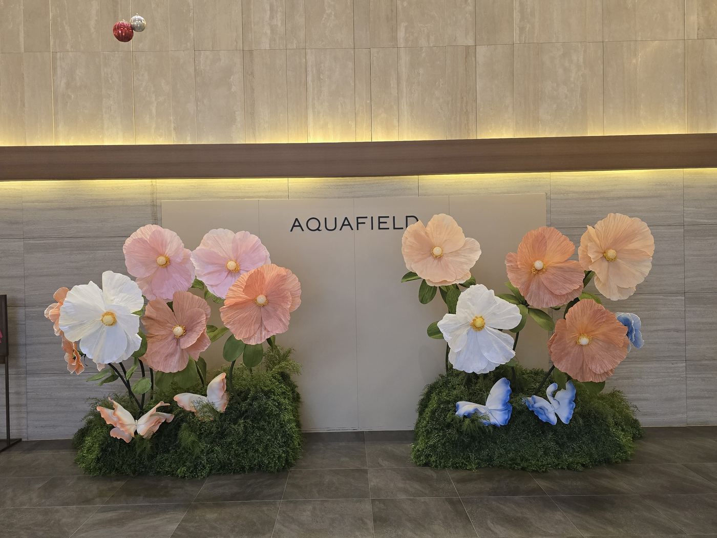 AQUAFIELD photo wall at the entrance