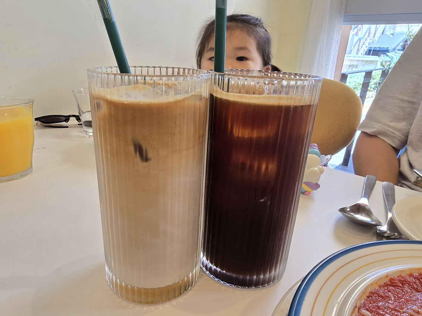 Drinks and toddler at Bicky Bakeshop