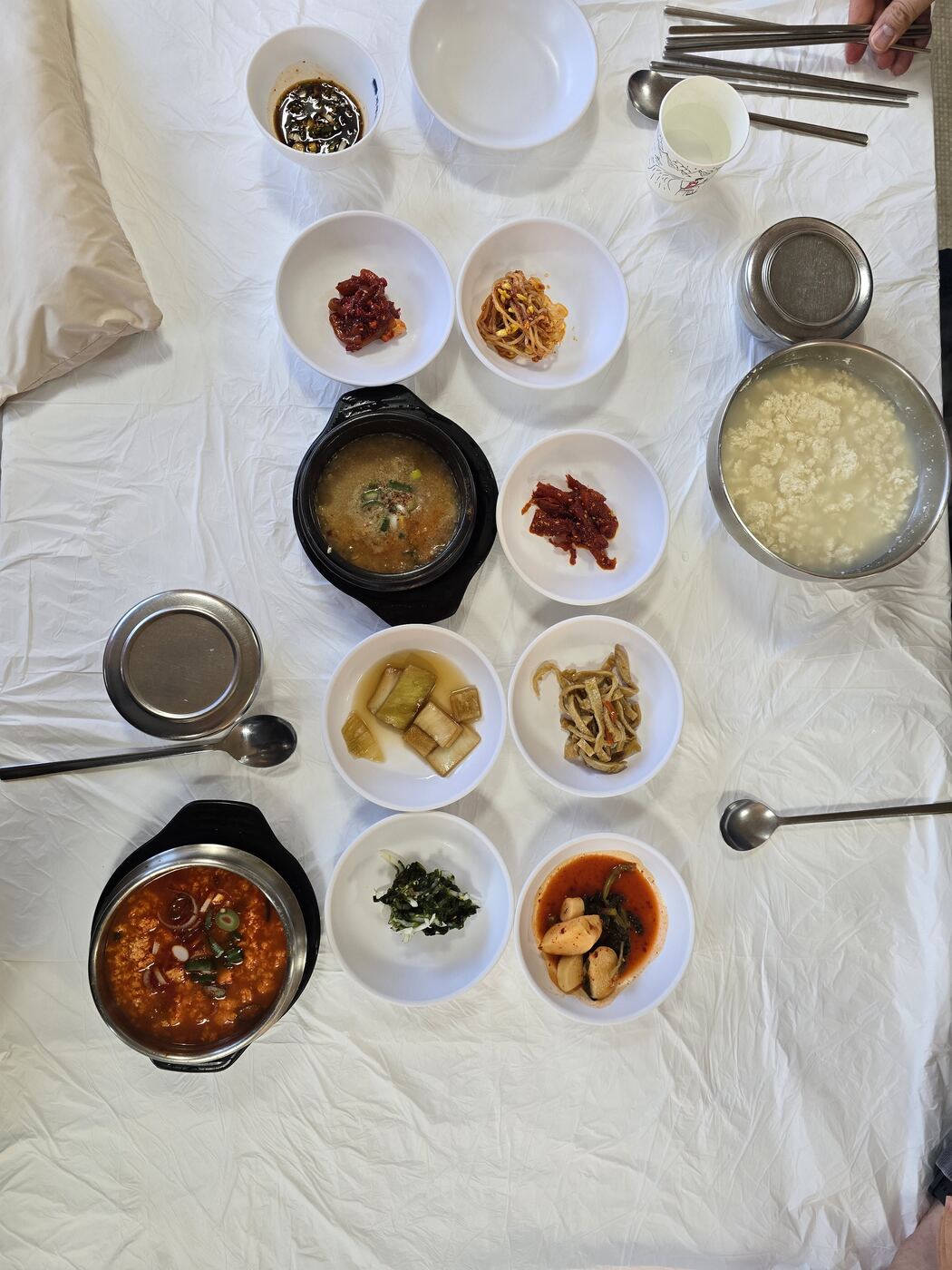 Sundubu jjigae meal with banchan at 송정희 어머니 순두부 Sokcho