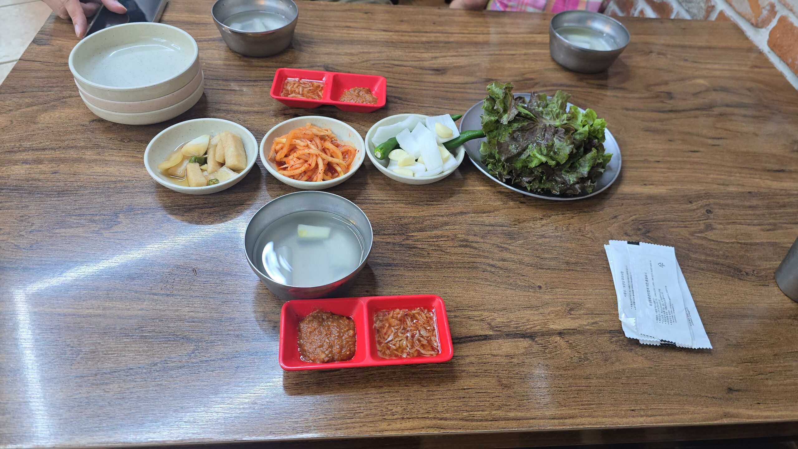 Korean side dishes (banchan) served with jokbal in Jangchung-dong Seoul