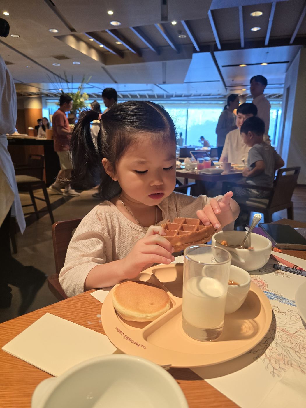 Child eating breakfast at The Parkview