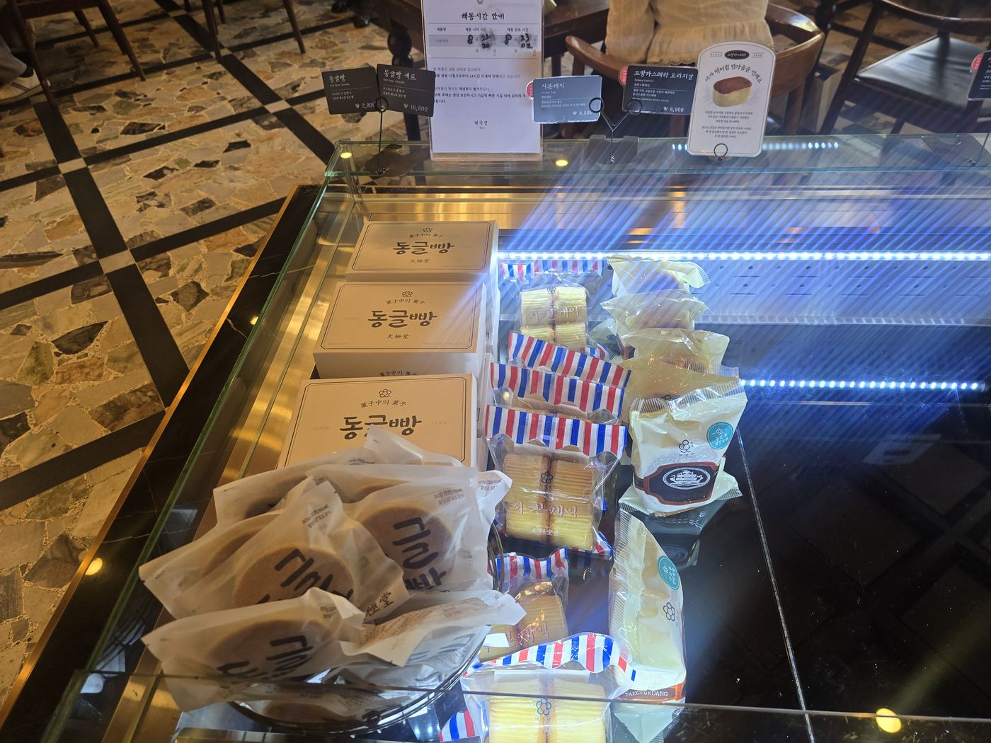 Bread and pastry display case at Taegukdang Bakery Seoul