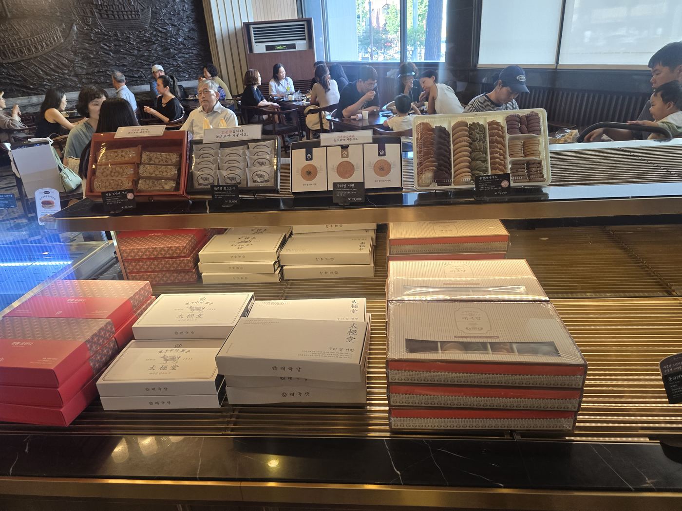 Gift boxes of bread and pastries from Taegukdang Bakery Seoul, ready for takeaway