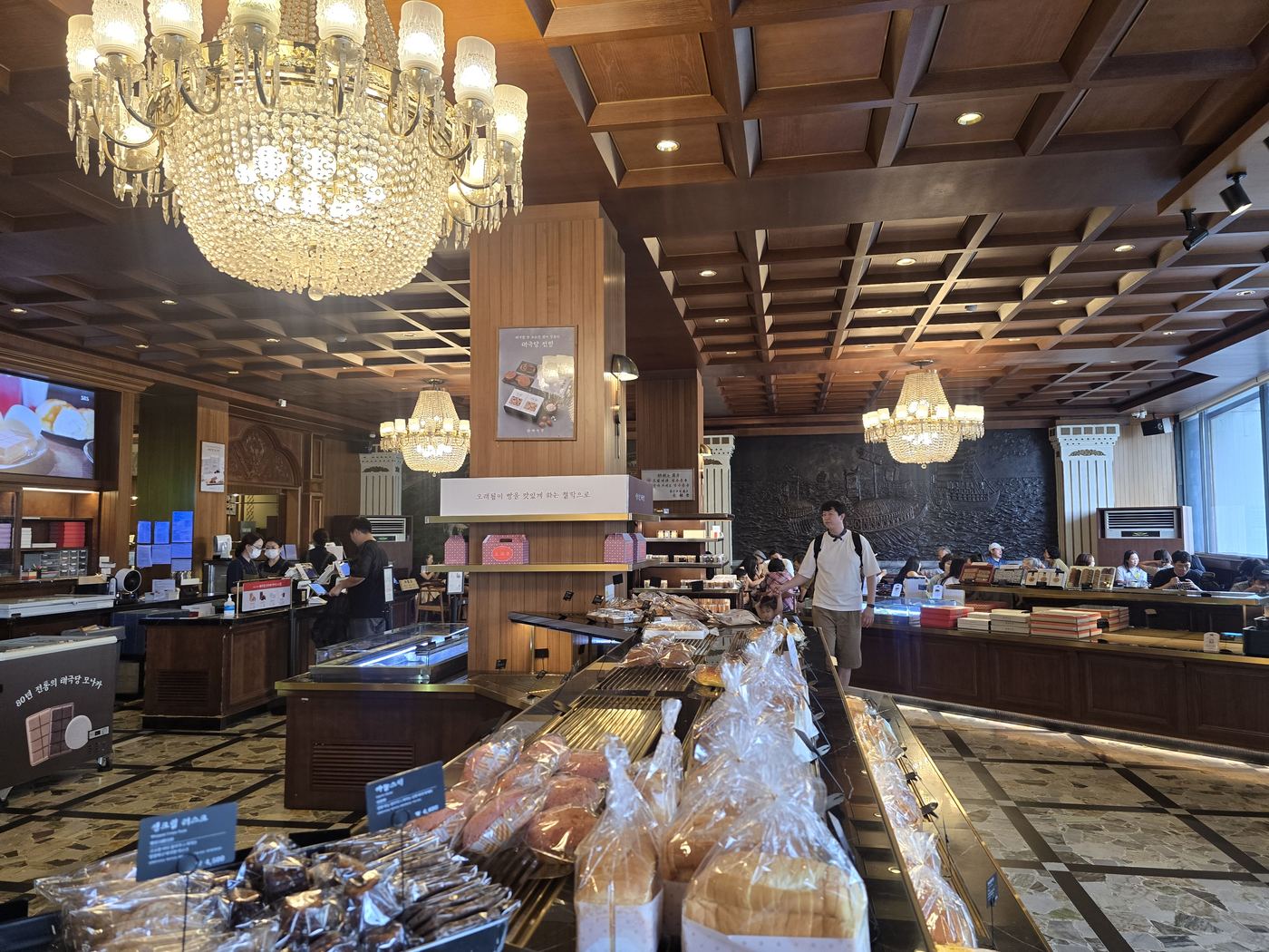 Interior view of Taegukdang Bakery in Seoul with vintage bakery counters and display cases
